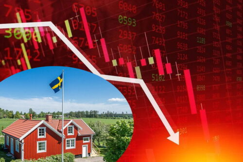 En röd stuga och en stor pil nedåt