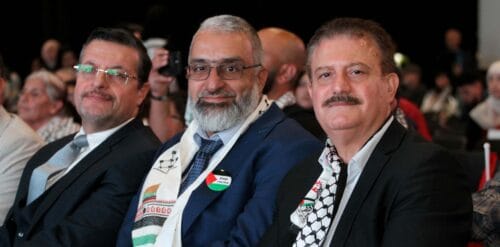 Tre män på palestinsk konferens