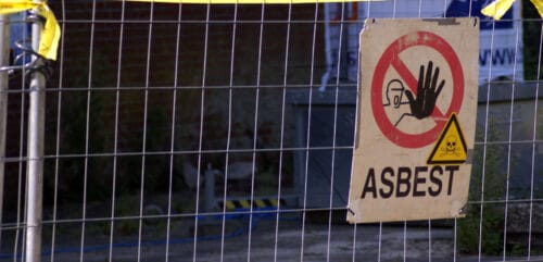 Varningsskylt om asbest
